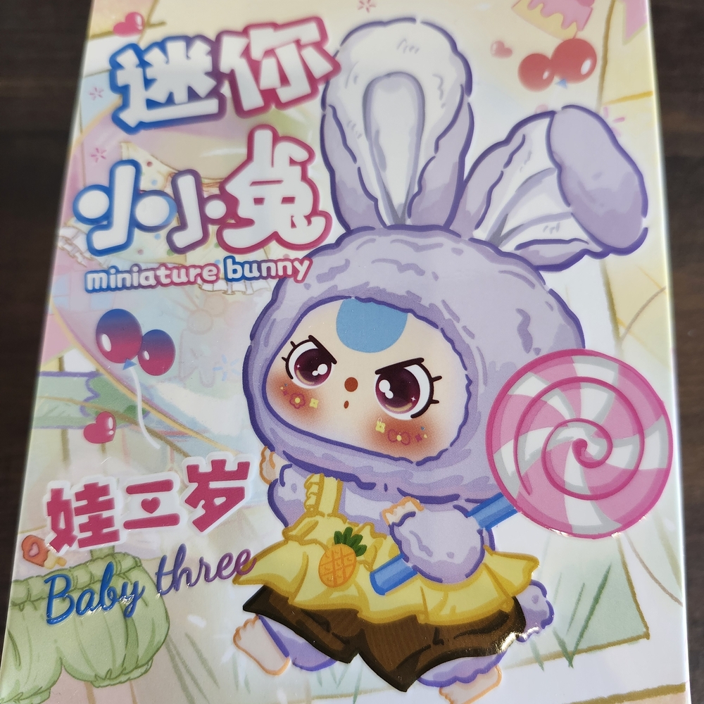 Miniature Bunny Doll with Purple and Yellow Outfit